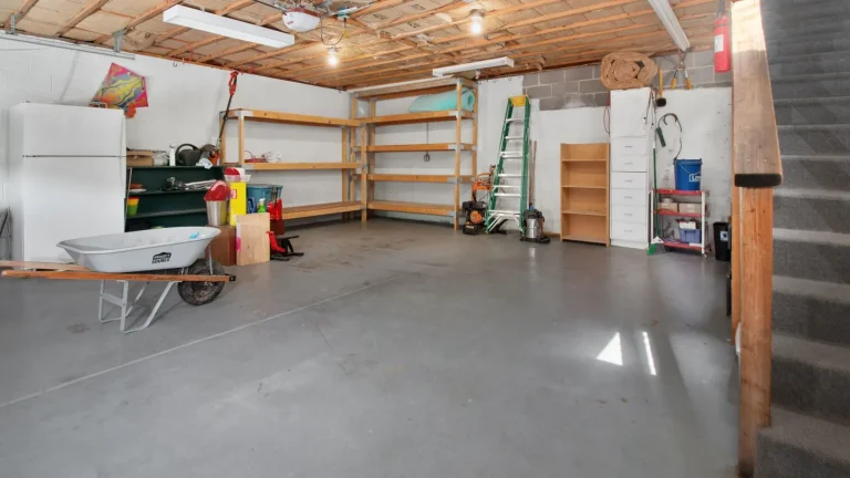Bright garage interior with an overhead door, cable and drum repair in Murfreesboro