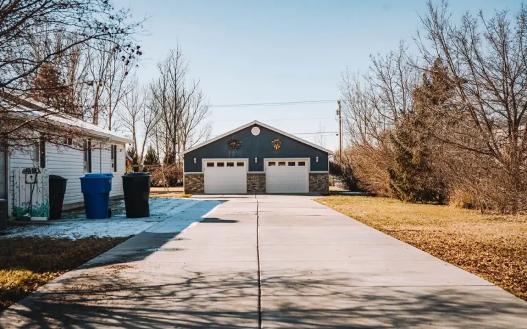 Detached two-door garage at the end of a long driveway in Christiana, TN